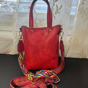 Le Miel red small bucket with multicolored cloth crossbody strap